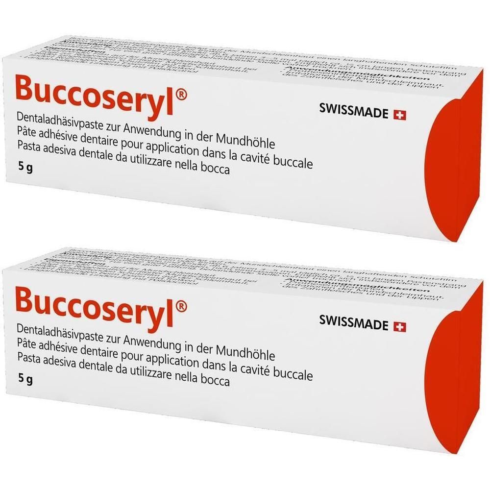 Zwei weiße Tuben mit rotem Akzent. Aufschrift: Buccoseryl, Dentaladhäsivpaste, 5 g. Swissmade-Logo.