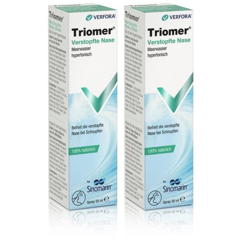 Deux boîtes de spray nasal Triomer. Boîtes blanches avec nom du produit et accents verts. Texte : Nez bouché, eau de mer.
