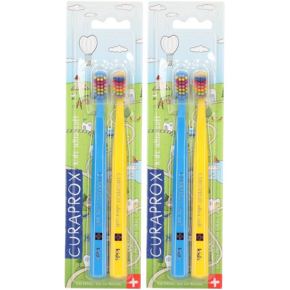 Zwei Zahnbürsten-Verpackungen. Jede Packung enthält zwei Zahnbürsten, eine blaue und eine gelbe. Aufschrift: CURAPROX kids.