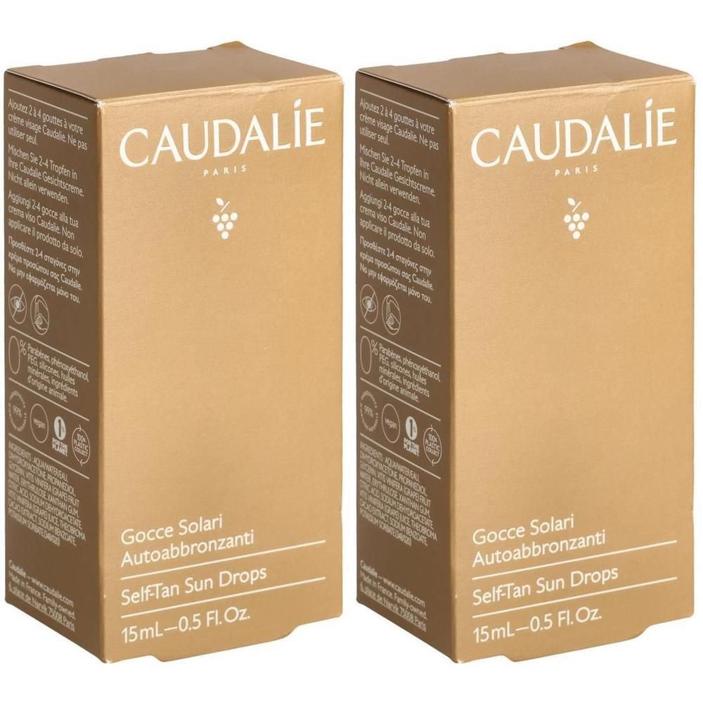 Deux boîtes de CAUDALIE Self-Tan Sun Drops. Inscription : Gocce Solari Autoabbronzanti, Self-Tan Sun Drops, 15ml-0.5 FL. Oz. Marque et logo visibles.