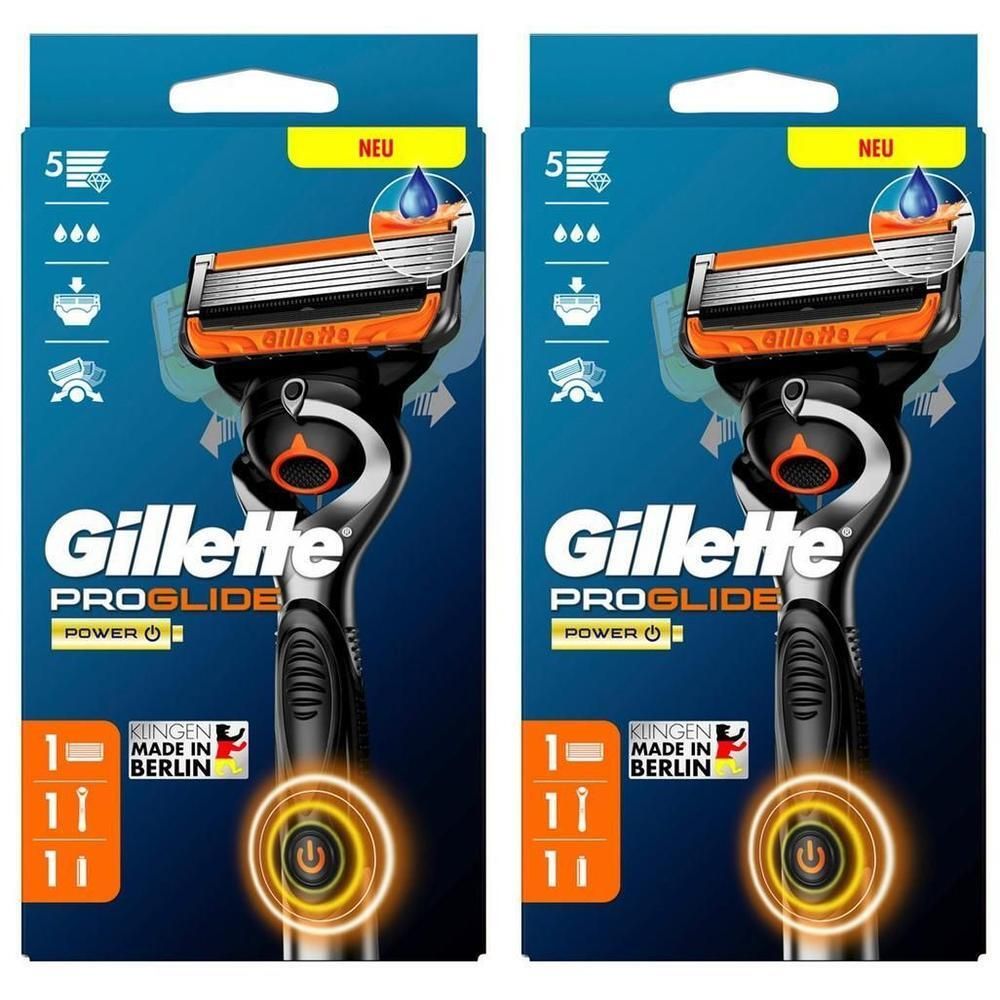 Deux emballages de rasoirs Gillette ProGlide Power. Emballage avec rasoir et lames. Inscription : Lames fabriquées à Berlin.