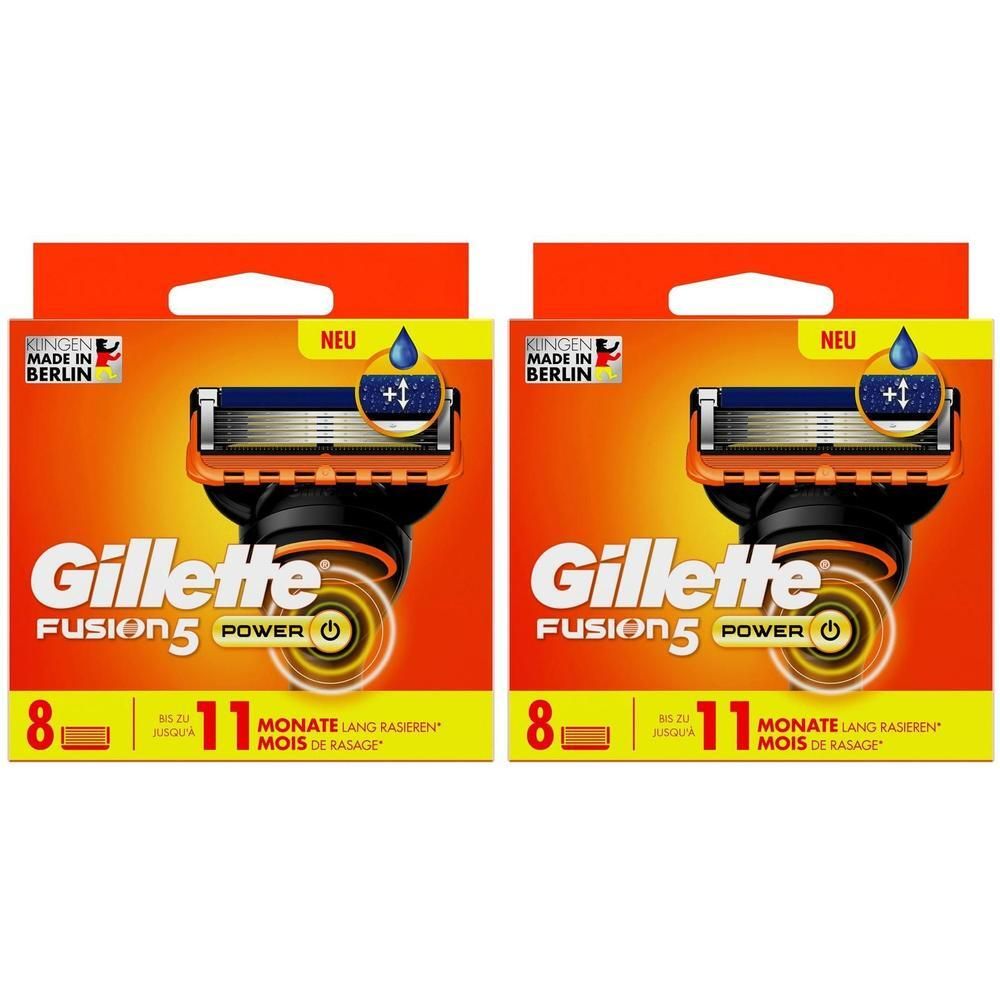 Deux paquets Gillette Fusion5 Power. Emballage orange avec image de lames. Texte: Gillette, Fusion5 Power, 8 lames, 11 mois de rasage.