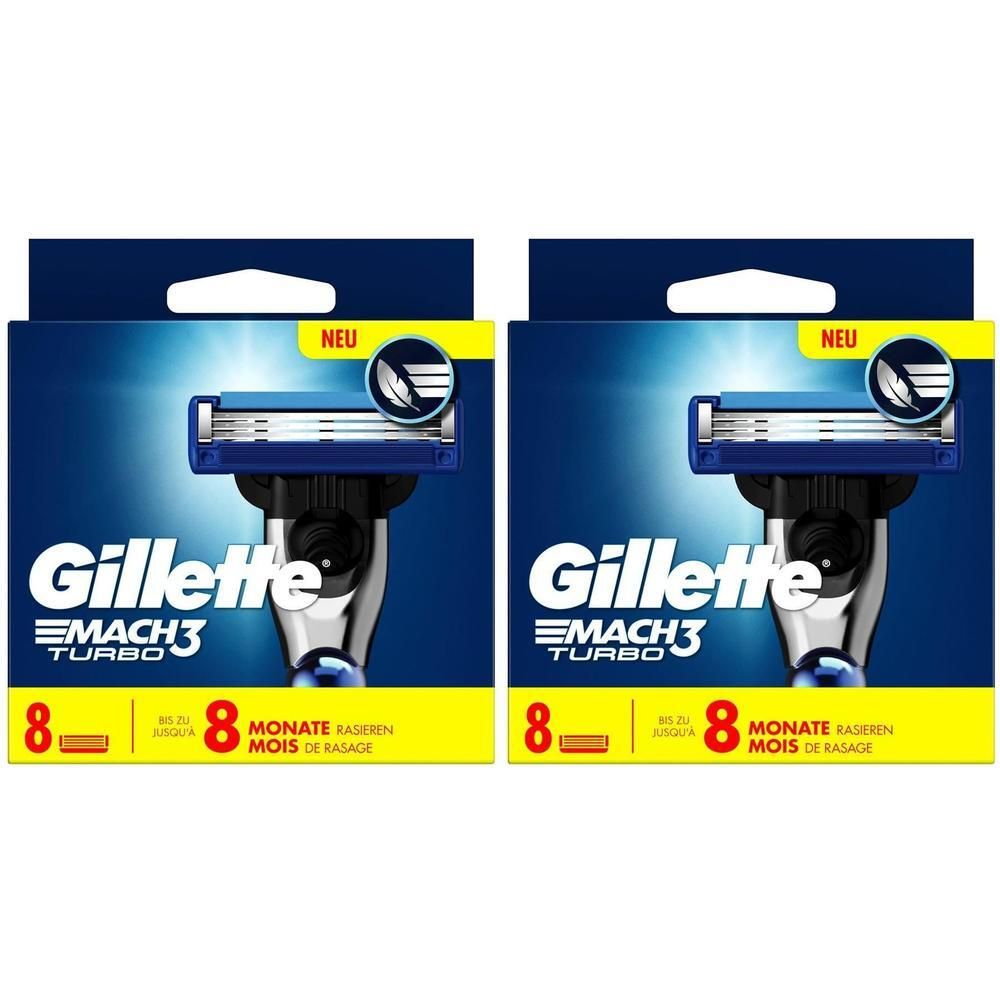 Deux boîtes de lames de rasoir Gillette Mach3 Turbo. Chaque boîte contient 8 lames. Rasoirs bleus et argentés visibles. Inscription : NEU.