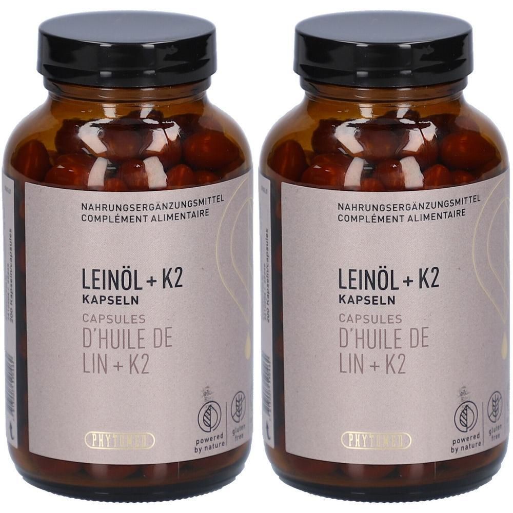 Deux flacons en verre brun avec des bouchons noirs. Les étiquettes indiquent "LEINÖL + K2 CAPSULES".