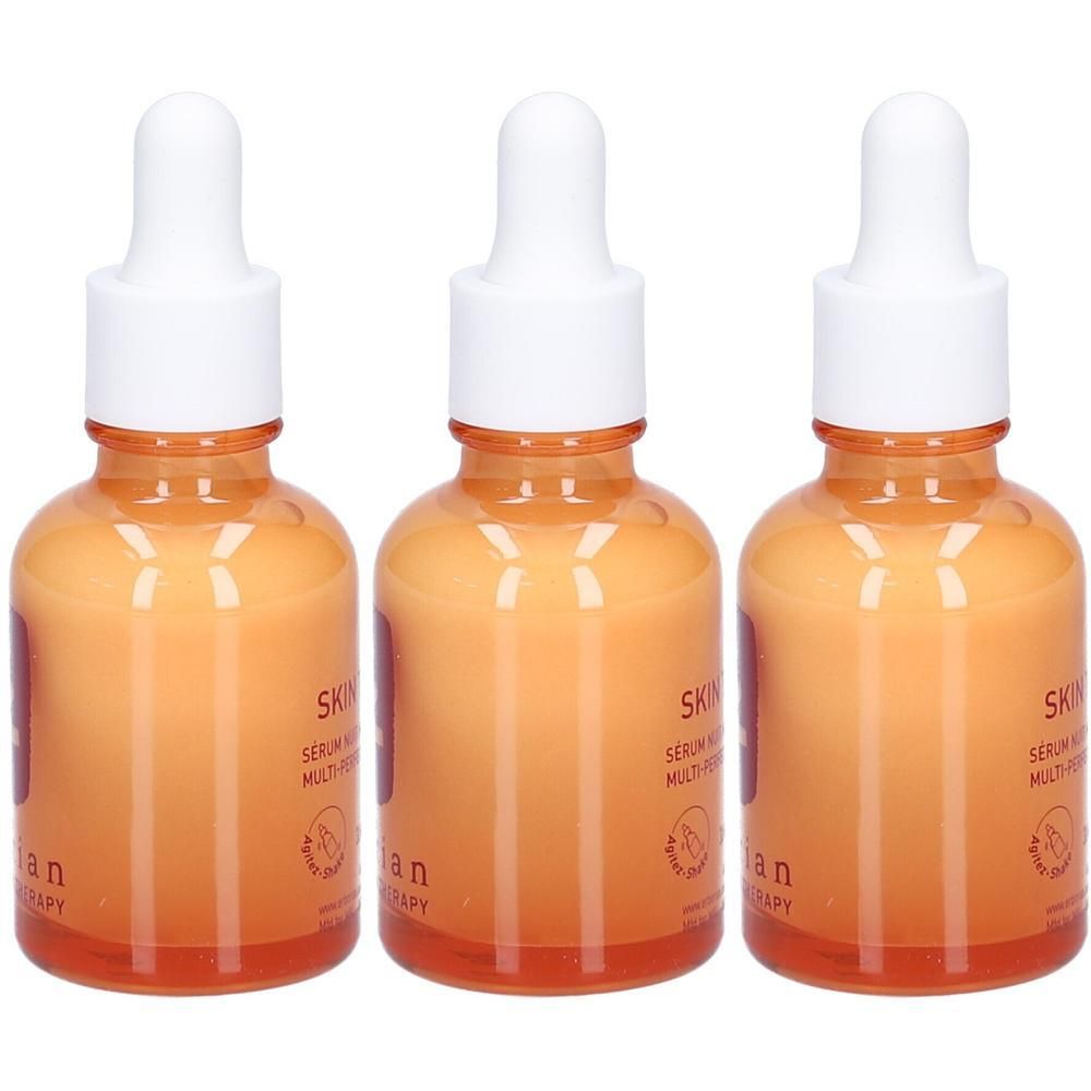 Drei Fläschchen mit Pipettenverschluss, gefüllt mit orangefarbenem Serum.