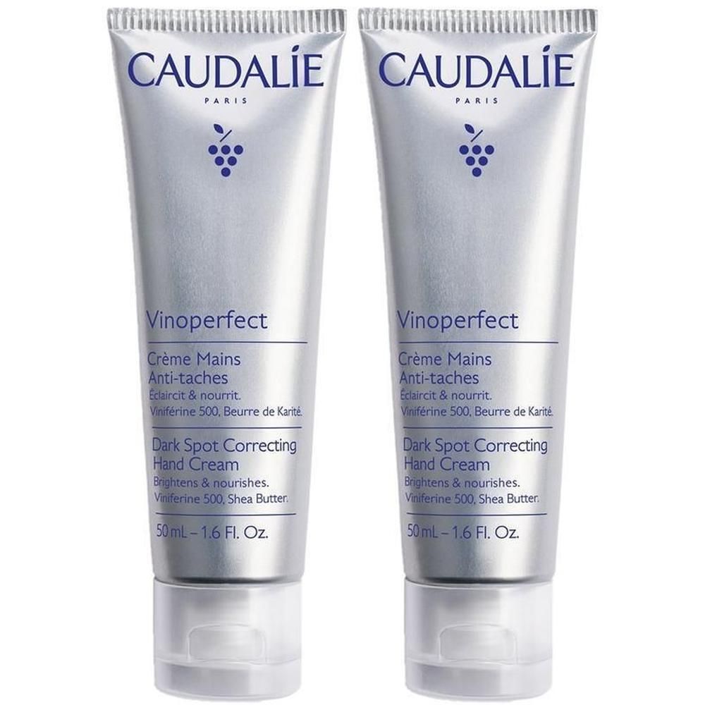 Deux tubes de crème pour les mains. Inscription: CAUDALIE, Vinoperfect, Dark Spot Correcting Hand Cream. 50ml.