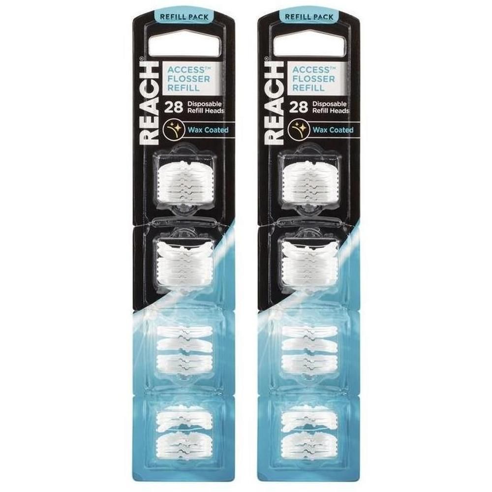Deux paquets de recharges REACH Access Flosser. Emballage noir avec têtes blanches. Contient 28 pièces, cirées.
