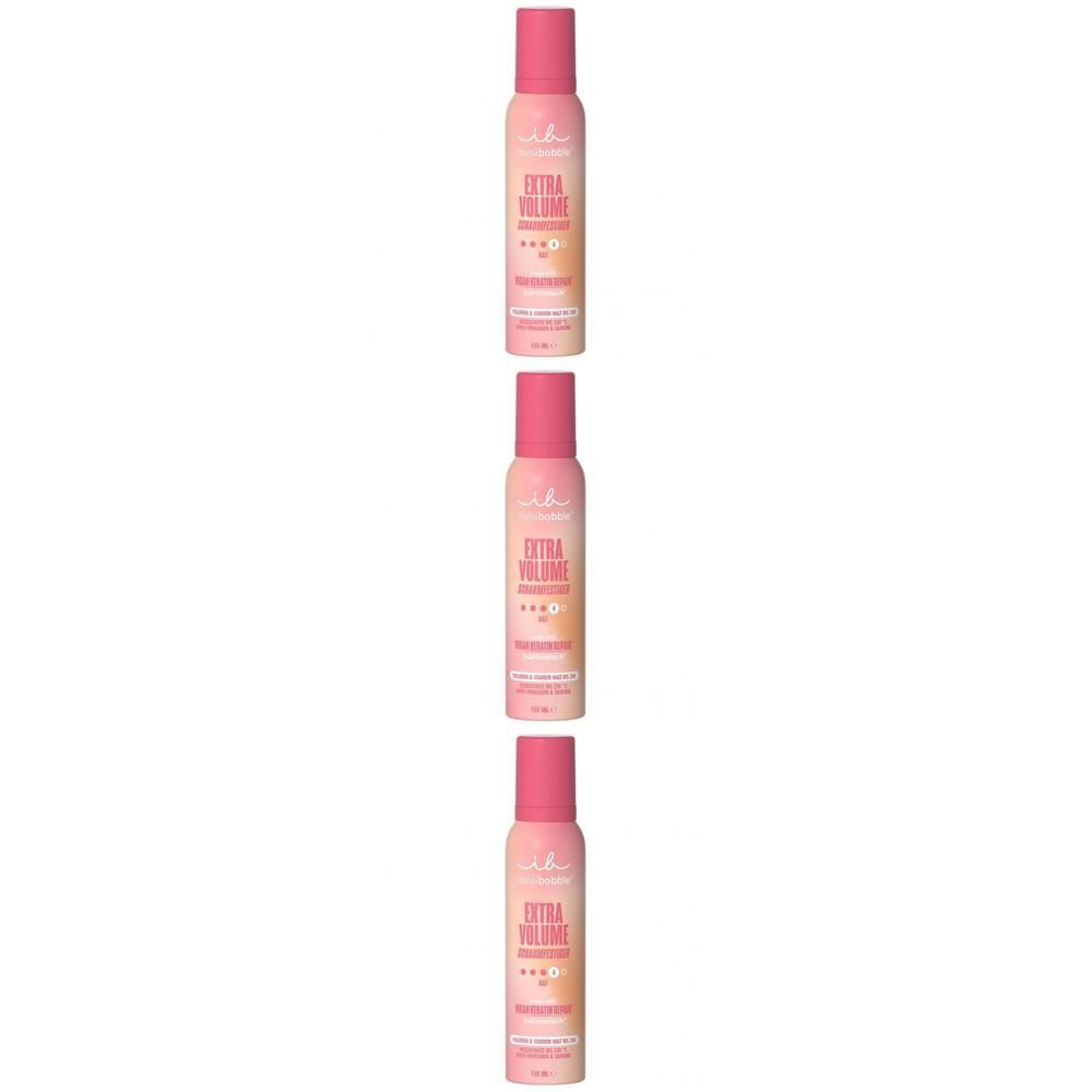 Trois bombes aérosols de mousse coiffante invisibobble® Extra Volume, roses et oranges.