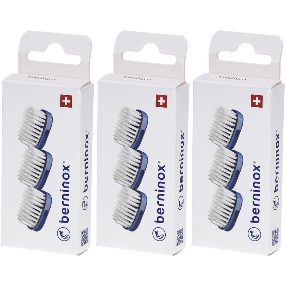 Trois boîtes de têtes de rechange. Têtes de brosse bleues avec des soies blanches. Croix suisse sur l'emballage. Marque: berninox.