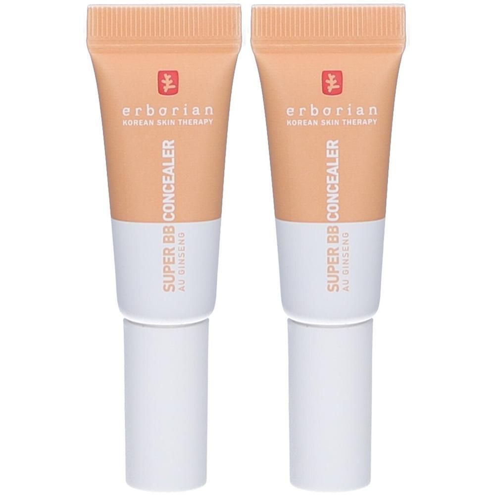 Zwei Erborian Super BB Concealer in der Farbe Doré mit SPF25. Pfirsichfarbene Tuben mit weißem Verschluss.