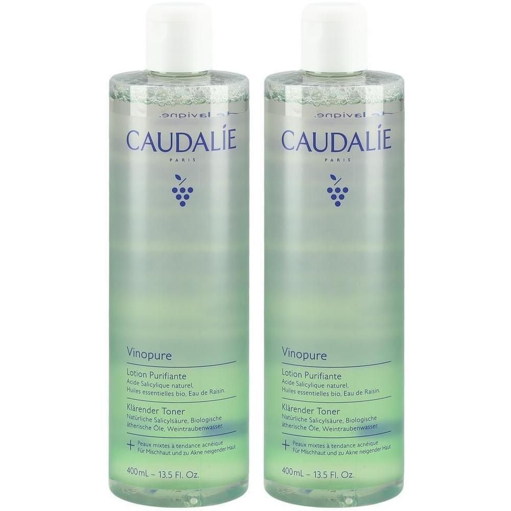 Zwei Flaschen CAUDALIE Vinopure Lotion. Klare Flüssigkeit in zylindrischen Flaschen mit weißem Deckel. Text und Logo sichtbar.