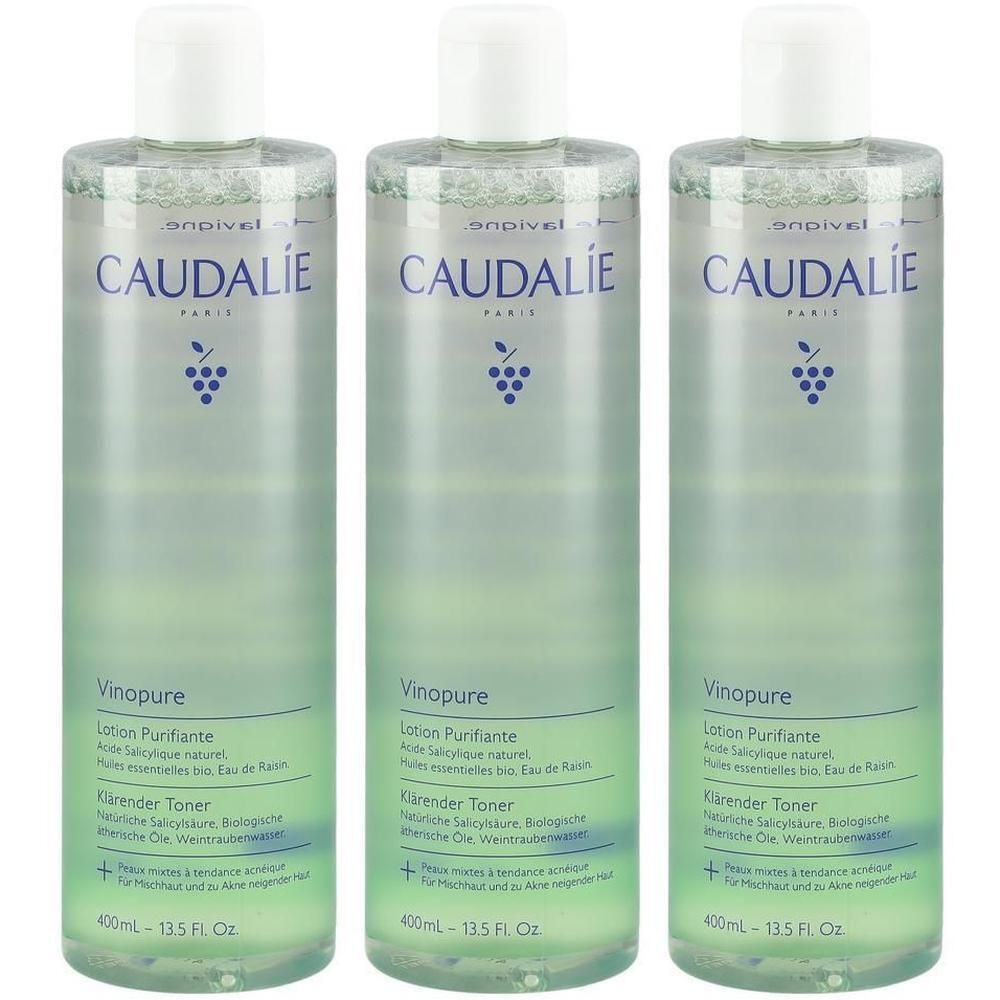 Drei Flaschen mit weißem Deckel und grüner Flüssigkeit. Aufschrift: CAUDALIE, Vinopure Lotion Purifiante, klärender Toner.
