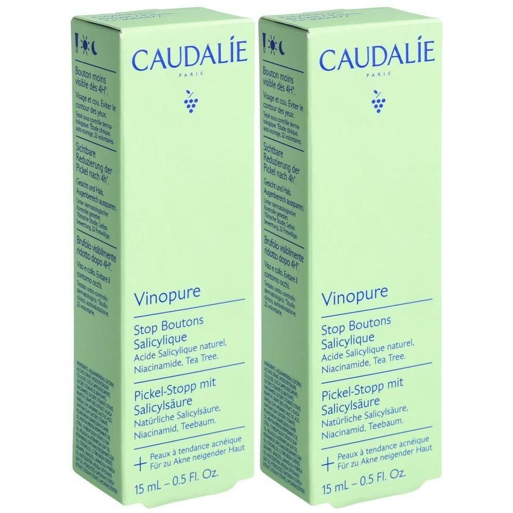 Zwei grüne Kartons mit Produktinformationen. Aufschrift: CAUDALIE, Vinopure, Pickel-Stopp mit Salicylsäure. 15 ml.