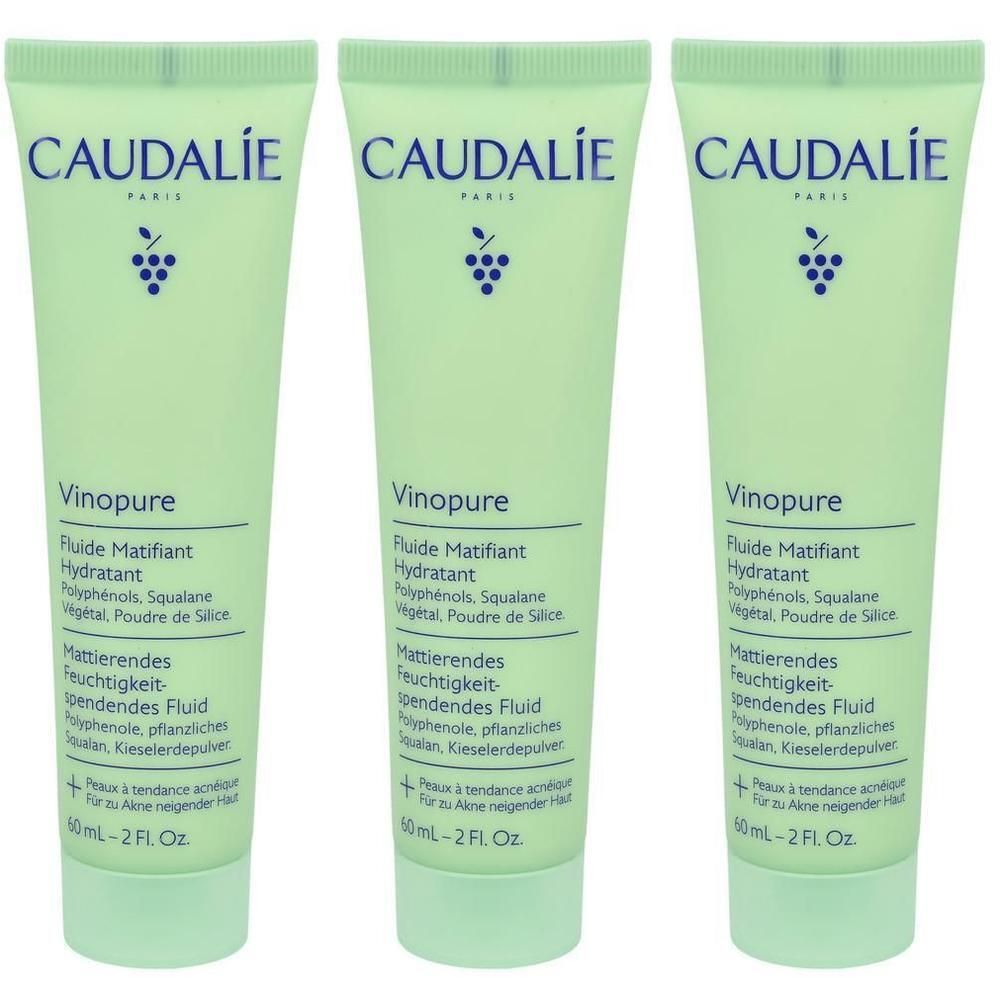 Drei Tuben CAUDALIE Vinopure Fluid. Hellgrüne Verpackung mit Schriftzug und Trauben-Logo. Text in Deutsch und Französisch.