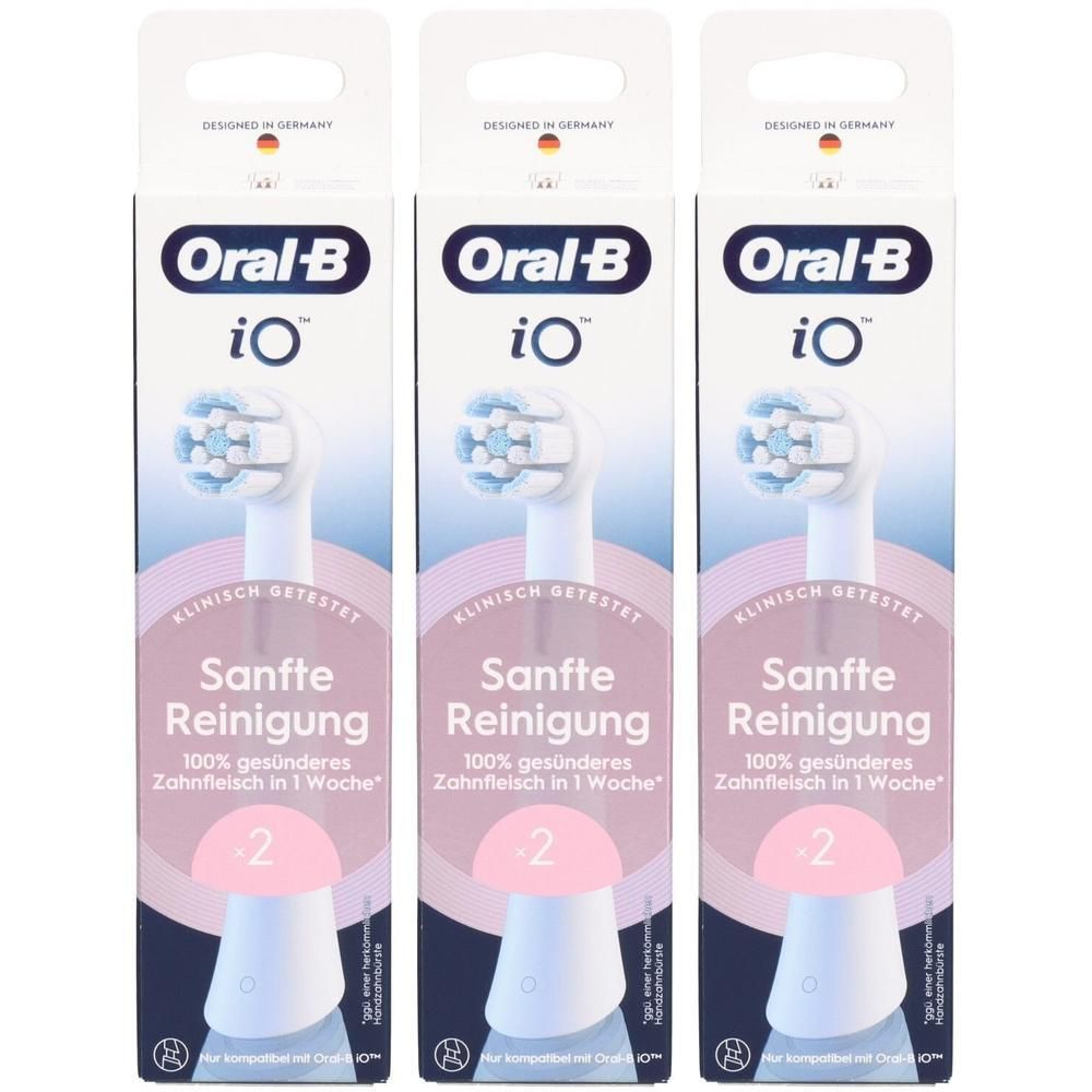 Trois paquets de têtes de brosse Oral-B iO. Chaque paquet montre une brosse blanche avec des poils bleu-gris. Texte: Nettoyage doux.