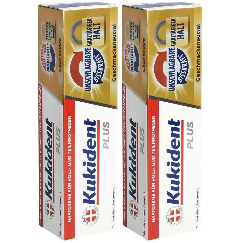 Zwei Tuben Haftcreme. Aufschrift: Kukident Plus. Verpackung mit Text: Unschlagbare Bisskraft, ganztägiger Halt.