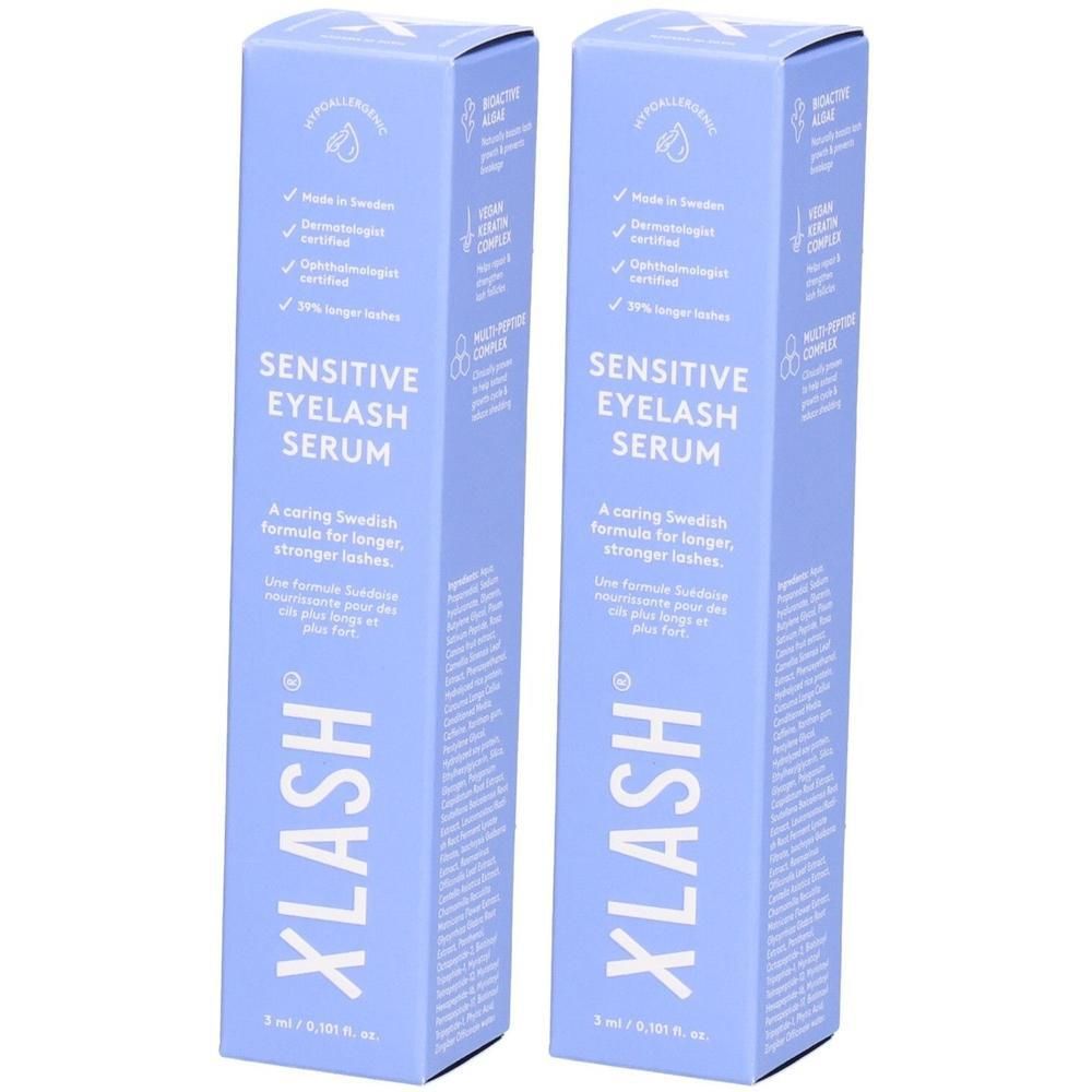 Zwei Packungen Xlash Sensitive Wimpernserum, blau, mit Textangaben.
