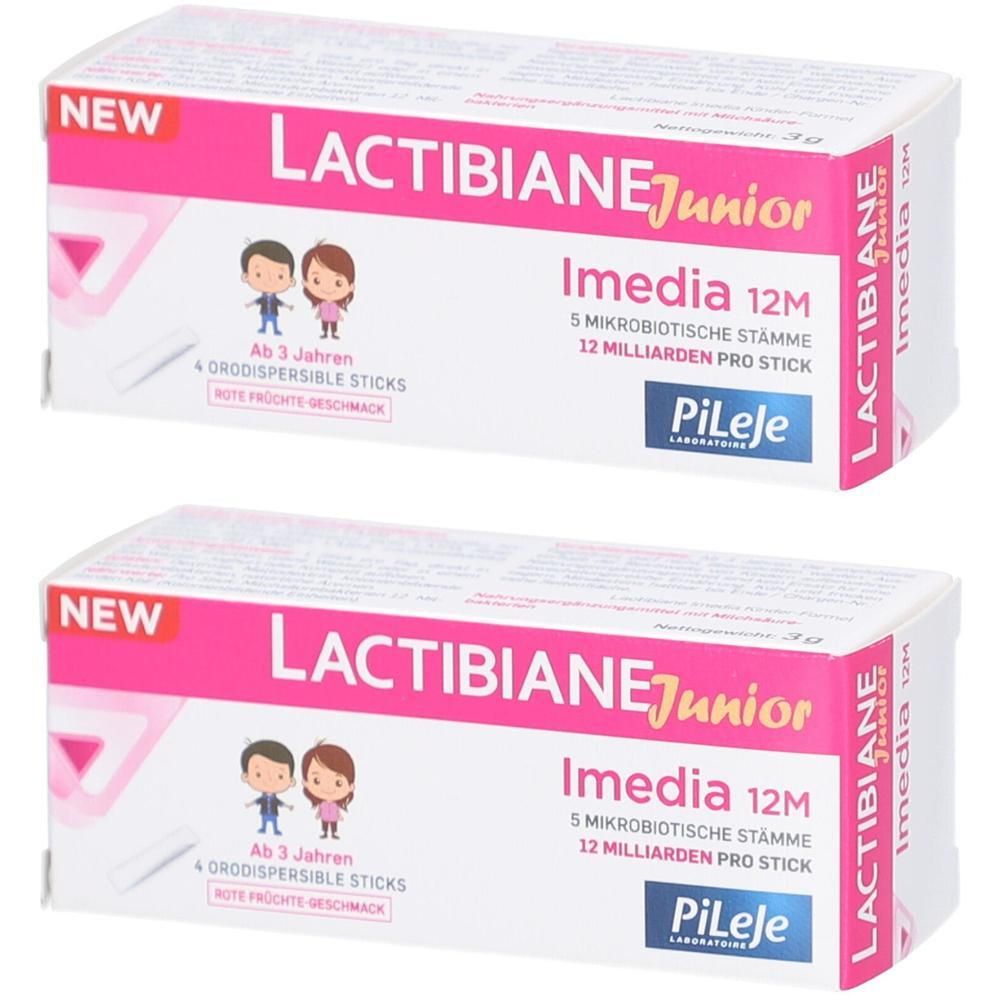 Zwei Packungen LACTIBIANE Junior Imedia 12M. Weiße Schachteln mit rosa Akzenten. Text: 5 mikrobiotische Stämme, 12 Milliarden pro Stick.