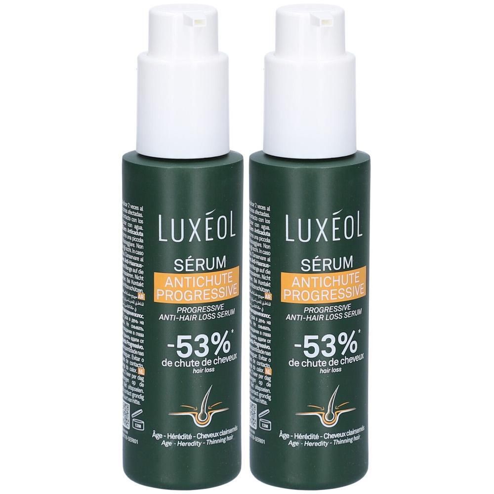 Zwei grüne Flaschen mit weißem Pumpkopf. Aufschrift: LUXEOL Sérum, Antichute Progressive, -53% de chute de cheveux.