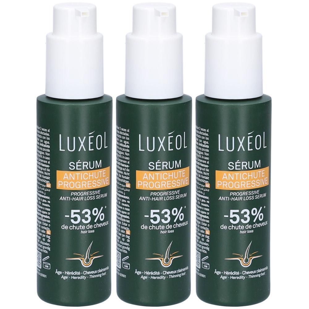 Trois flacons de sérum LUXEOL. Flacons vert foncé avec pompes blanches. Inscription : Sérum Antichute Progressive, -53%.