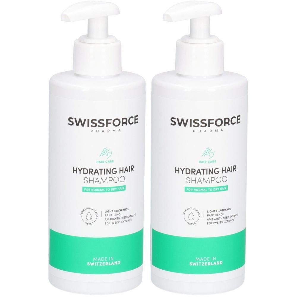 Zwei weiße Flaschen mit Pumpaufsatz. Aufschrift: SWISSFORCE, HYDRATING HAIR SHAMPOO. Hergestellt in der Schweiz.