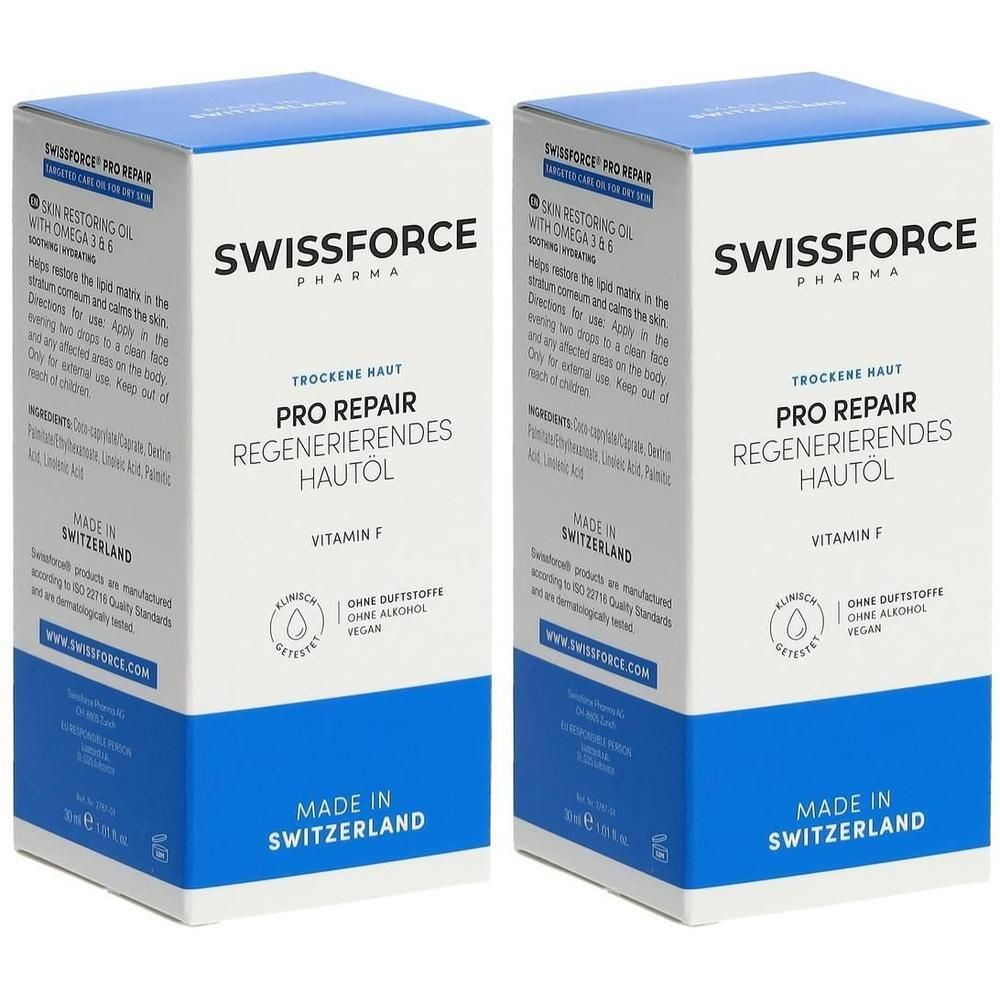 Deux boîtes rectangulaires. Inscription: SWISSFORCE, PRO REPAIR, Huile régénérante pour la peau, Vitamine F. Couvercle et base bleus.