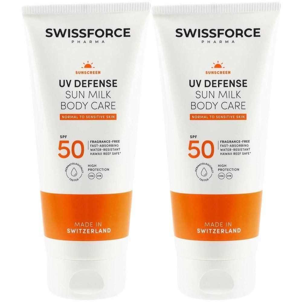 Zwei Tuben Sonnenmilch. Weiß, mit orangefarbenem Abschnitt. Aufschrift: SWISSFORCE, UV DEFENSE, SPF 50. Hergestellt in der Schweiz.