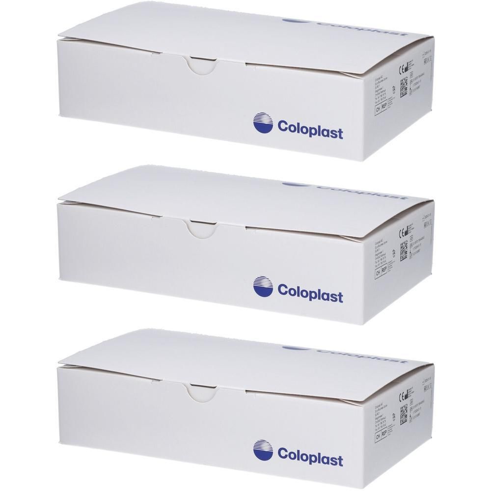 Trois boîtes Coloplast blanches, empilées. Chaque boîte a un logo et un texte bleus.