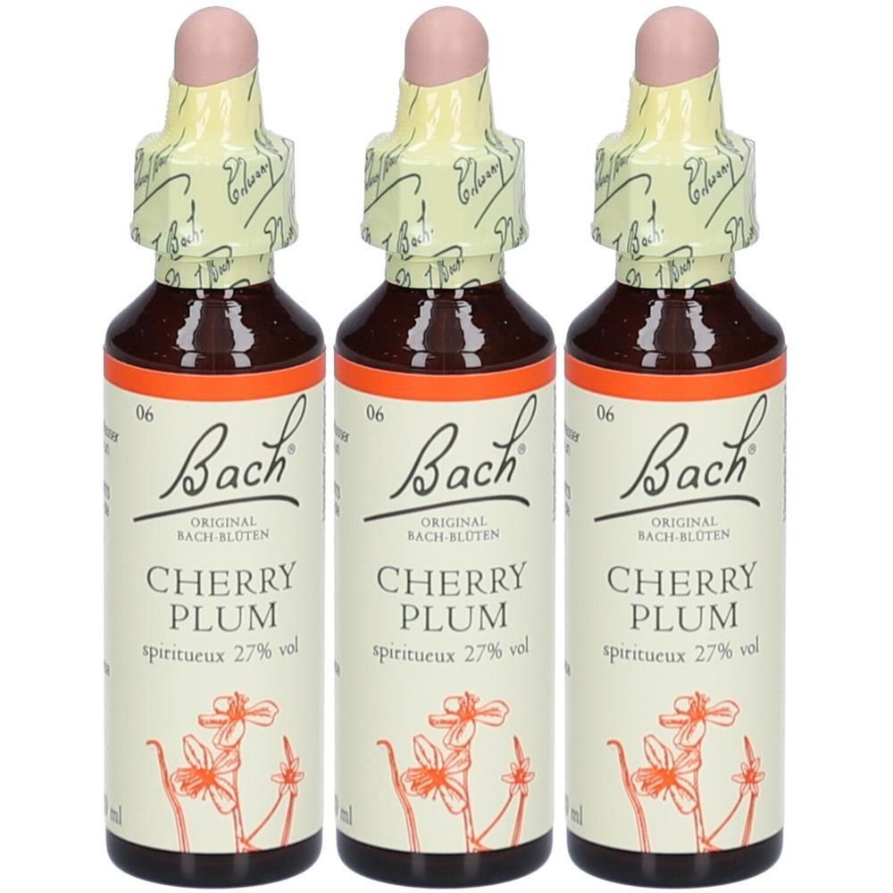 Drei Flaschen mit brauner Flüssigkeit. Aufschrift: Bach Original Cherry Plum, spiritueux 27% vol. Mit Tropfverschluss und gelbem Papier.