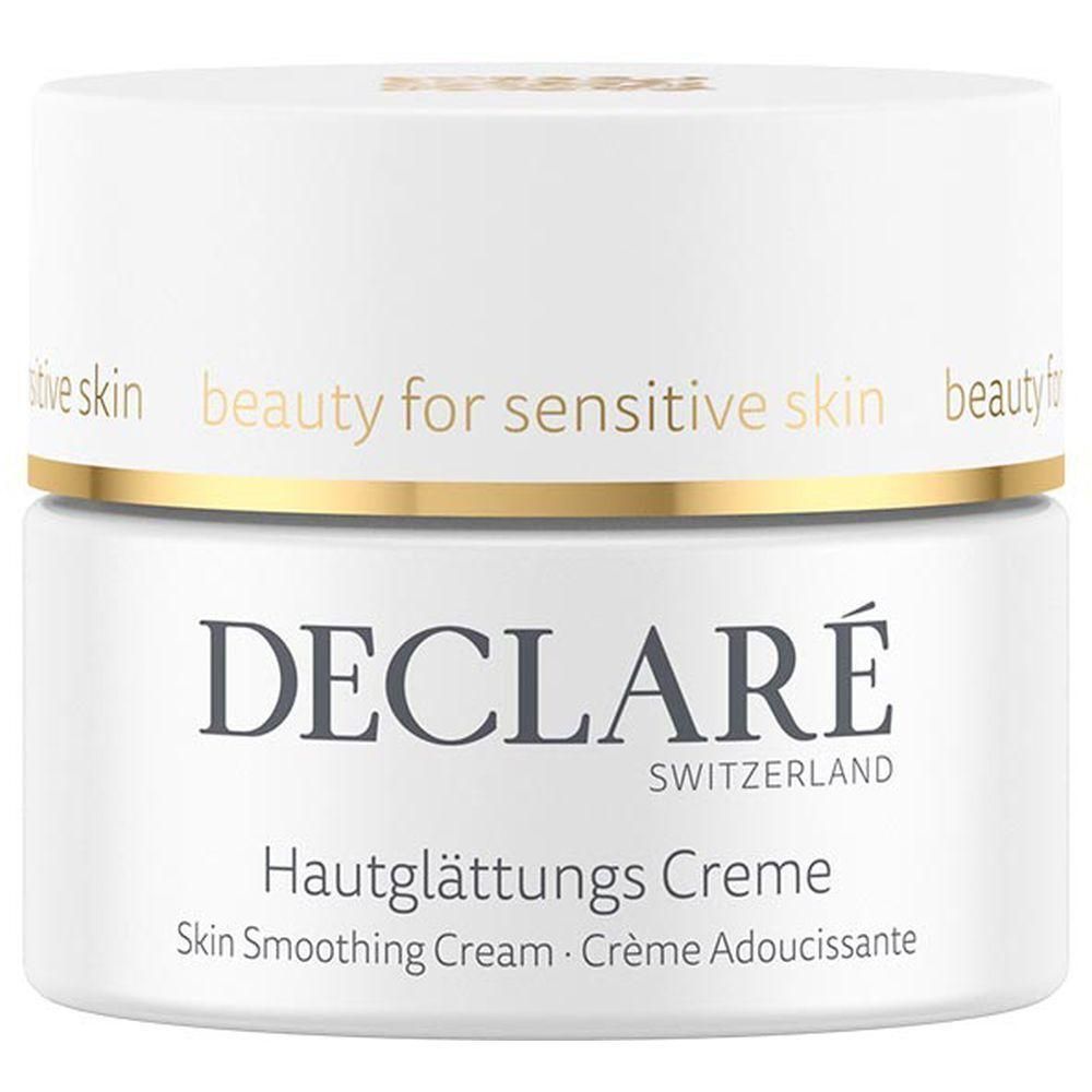 Creme-Tiegel mit Deckel. Aufschrift: DECLARÉ SWITZERLAND, Hautglättungs Creme, Skin Smoothing Cream, Crème Adoucissante. Goldfarbener Ring.