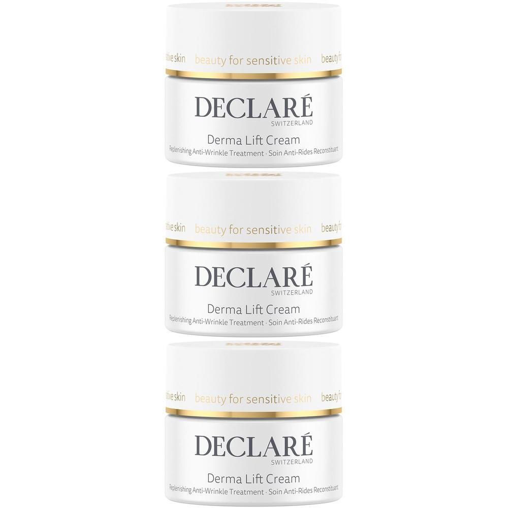 Drei weiße Tiegel mit DECLARÉ Derma Lift Creme, übereinander gestapelt.