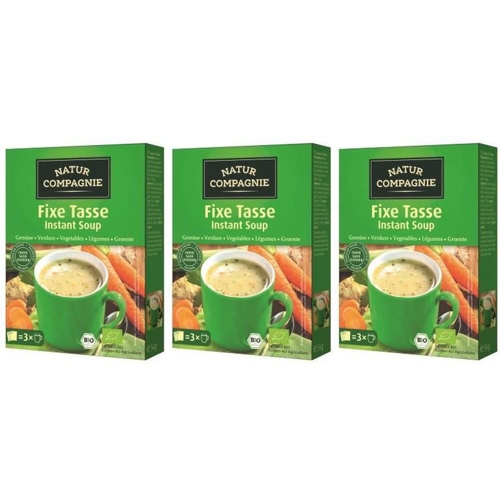 Drei grüne Kartons mit der Aufschrift NATUR COMPAGNIE Fixe Tasse Instant Soup. Bio-Siegel. Abbildung einer Tasse Suppe mit Gemüse.