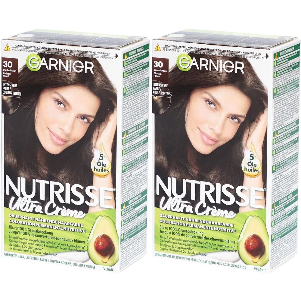 Deux boîtes de coloration Garnier Nutrisse Ultra Crème. Inscription : 30, image d'avocat, 5 huiles.