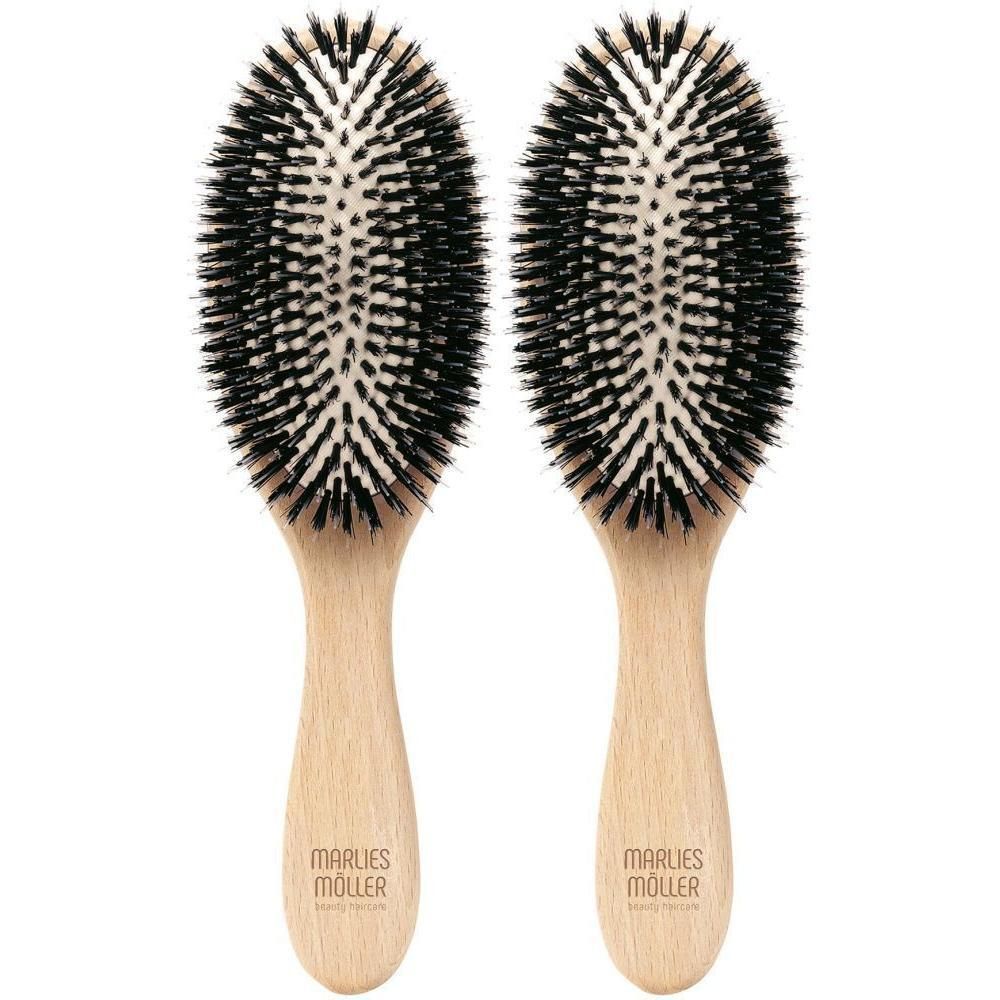 Deux brosses ovales avec manche en bois. Soies noires. Inscription sur le manche.