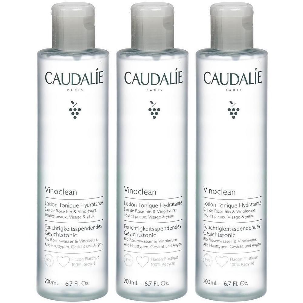 Drei Flaschen CAUDALIE Vinoclean Lotion Tonique. Weiße Flaschen mit grauen Deckeln. Text und Logo auf den Flaschen.