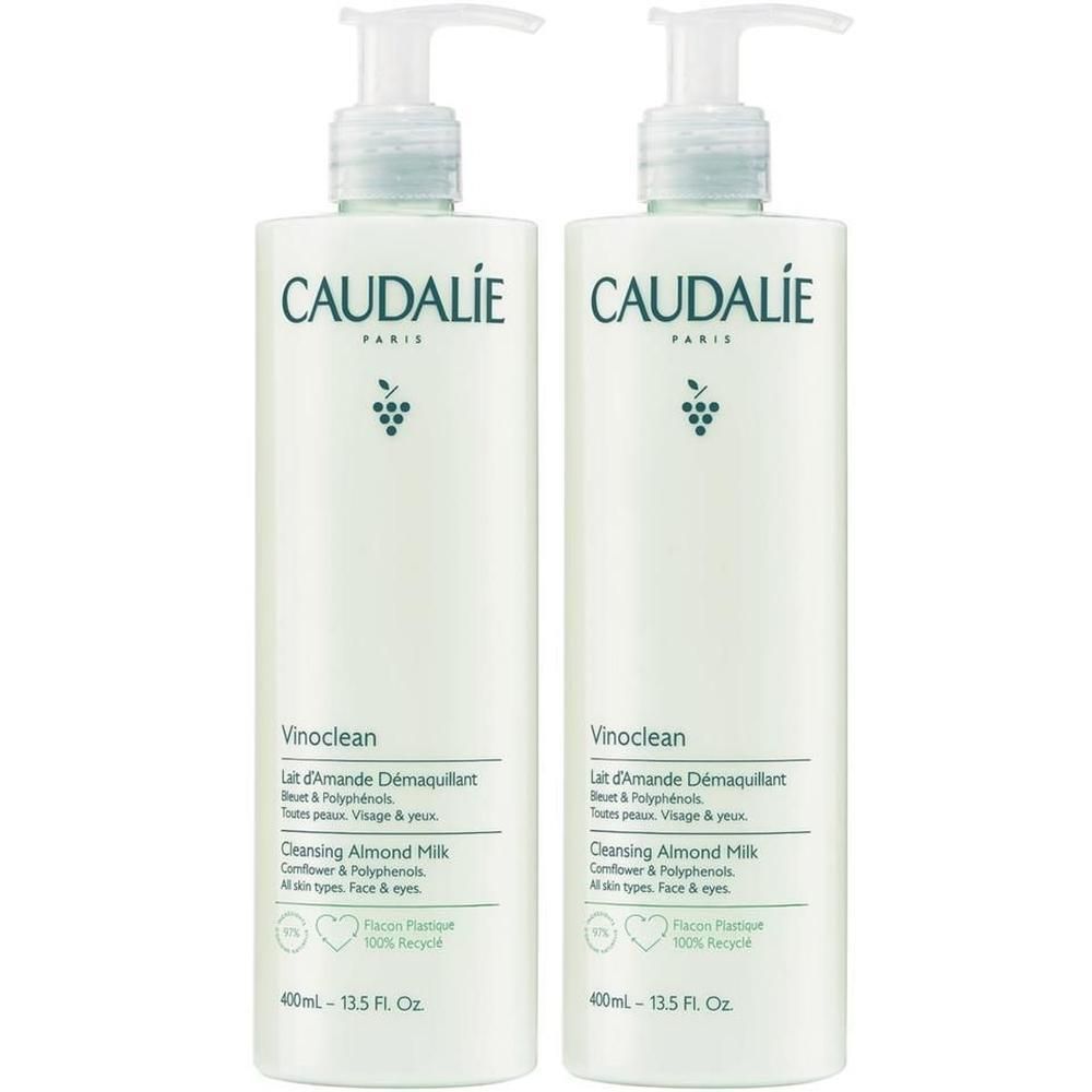 Zwei Flaschen CAUDALIE Vinoclean. Weiße Flaschen mit Pumpverschluss. Aufschrift: Vinoclean, Lait d'Amande Demaq, 400ml.