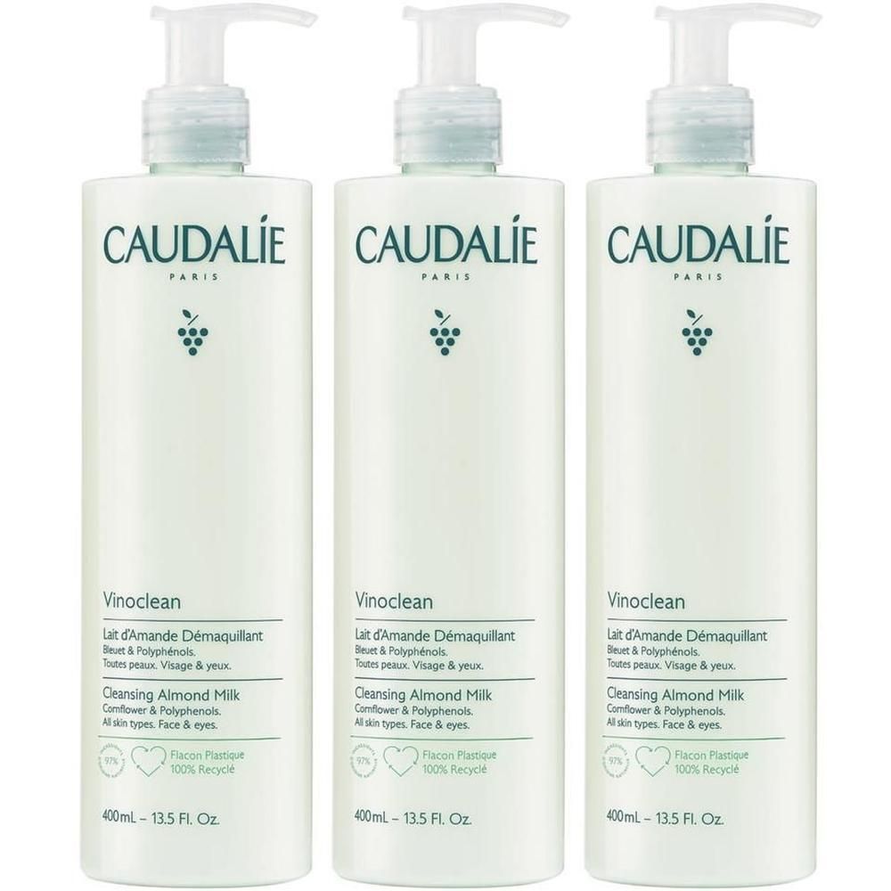 Drei Flaschen mit Pumpe. Aufschrift CAUDALIE, Vinoclean, Lait d'Amande Demaq, Cleansing Almond Milk. 400ml.