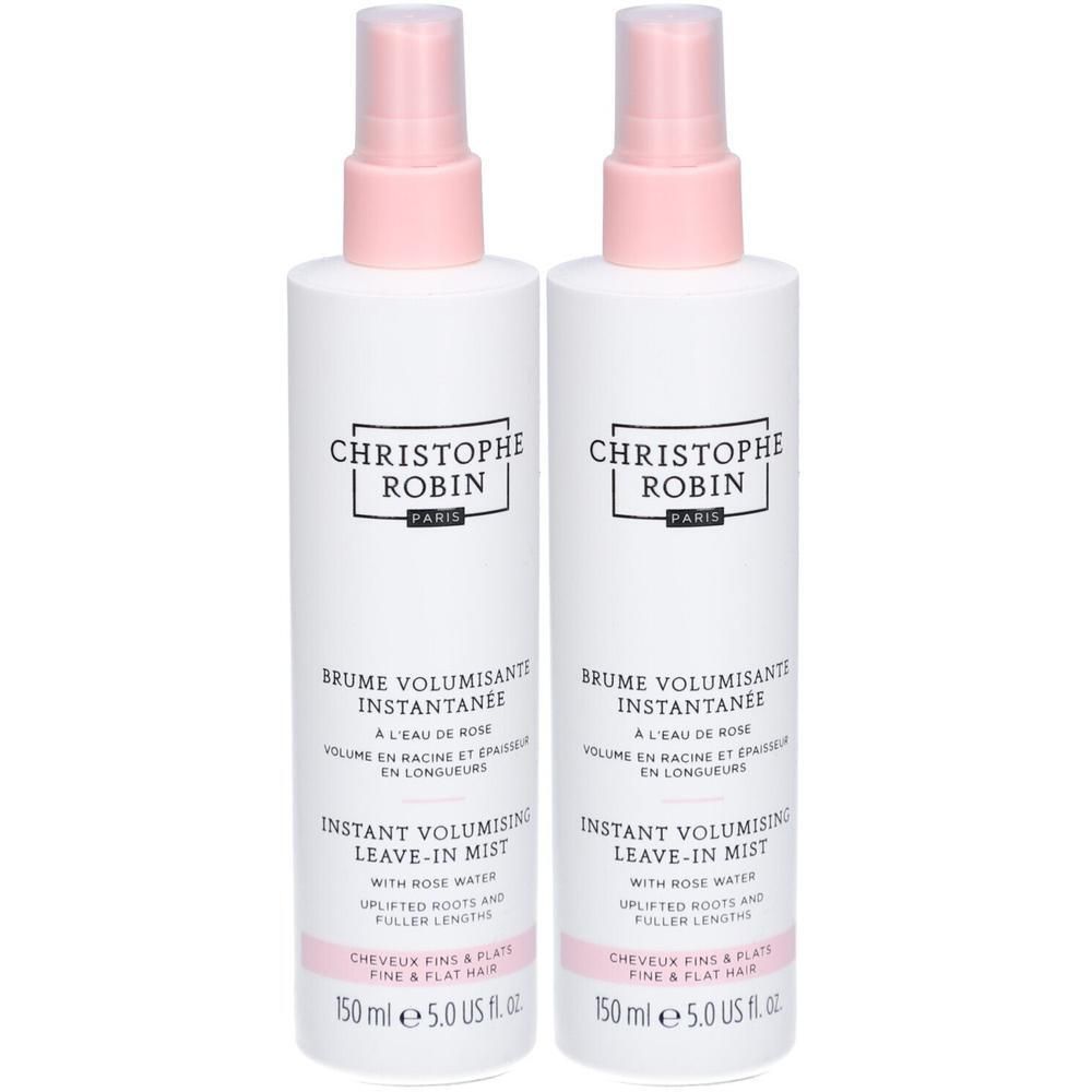 Zwei weiße Sprühflaschen mit rosa Sprühköpfen. Aufschrift: CHRISTOPHE ROBIN PARIS, Brume Volumisante Instantanee, Instant Volumising Leave-in Mist.