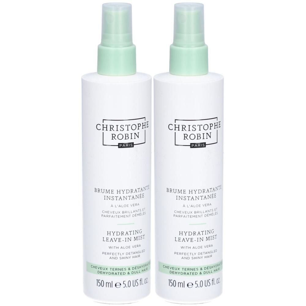 Deux flacons vaporisateurs blancs avec bouchons verts. Inscription: CHRISTOPHE ROBIN, Brume Hydratante Instantanee, Hydrating Leave-in Mist.