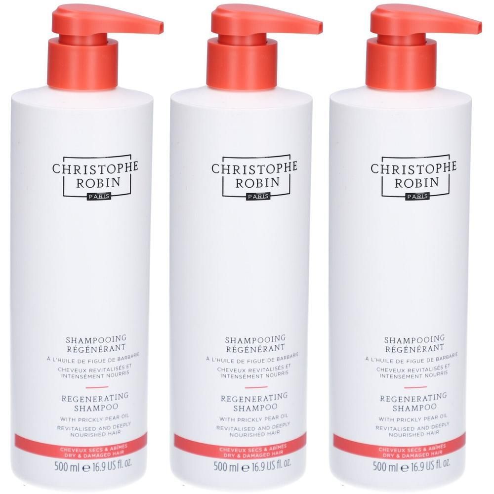 Drei weiße Shampoo-Flaschen mit rotem Pumpkopf. Aufschrift: CHRISTOPHE ROBIN, SHAMPOOING REGENERANT, REGENERATING SHAMPOO.