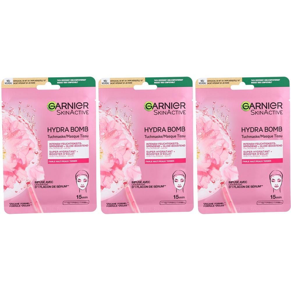 Drei Garnier SkinActive Hydra Bomb Gesichtsmasken mit Sakura und Hyaluronsäure in rosa Verpackung.