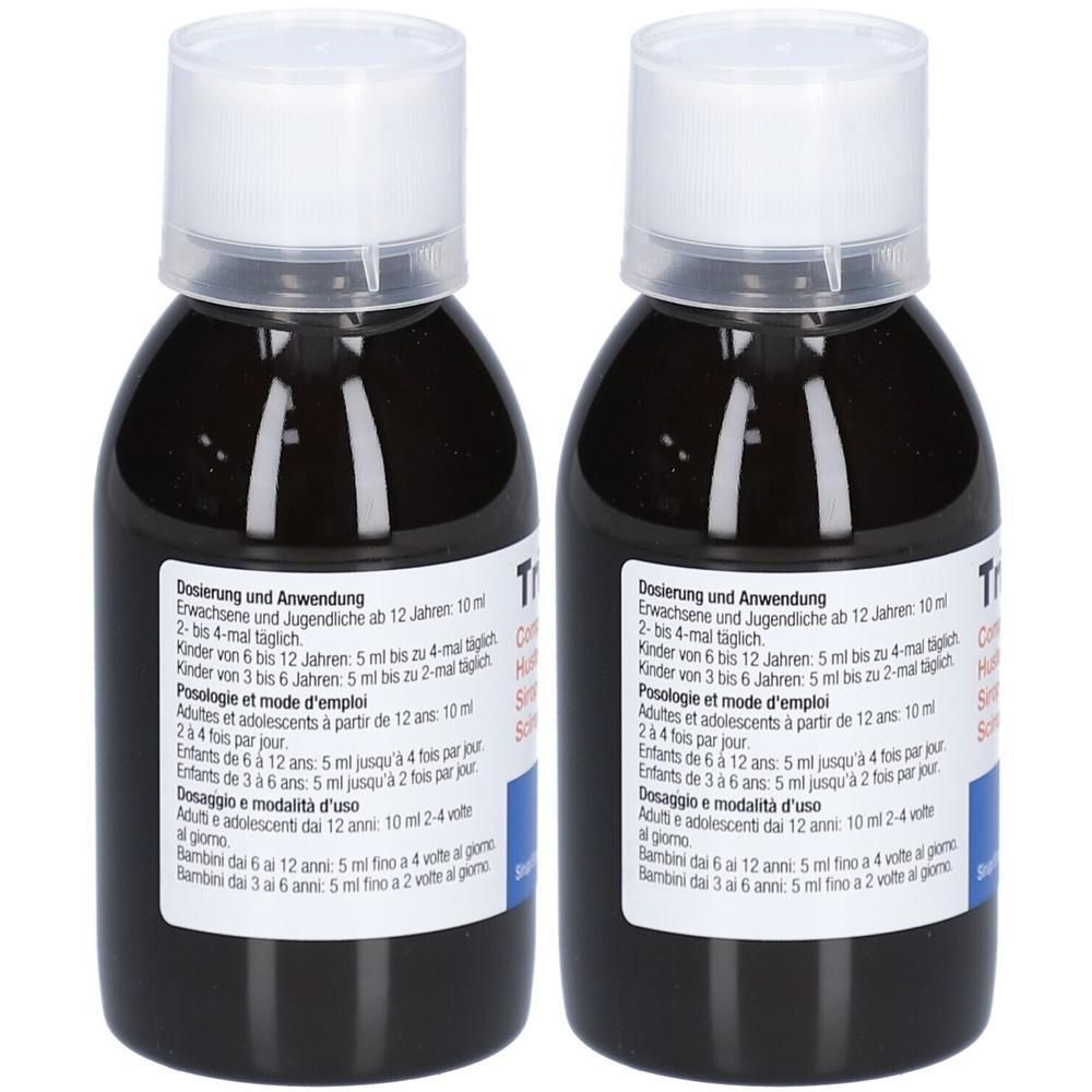 Deux flacons de sirop contre la toux avec bouchons blancs. Les étiquettes indiquent les instructions de dosage en plusieurs langues.