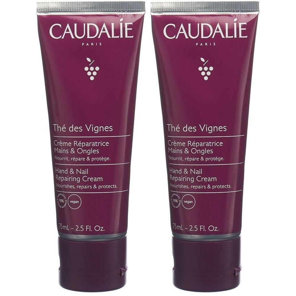 Zwei Tuben Hand- und Nagelreparaturcreme. Aufschrift: CAUDALIE PARIS, Thé des Vignes, Crème Réparatrice Mains & Ongles, 75ml.