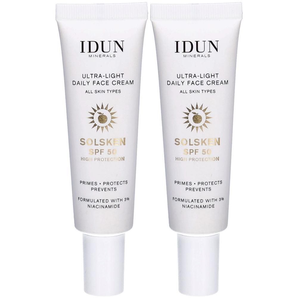 Zwei Tuben IDUN Minerals Ultra-Light Daily Face Cream. Weiß, mit Text und Logo. Sonnenschutzfaktor 50. Für alle Hauttypen.