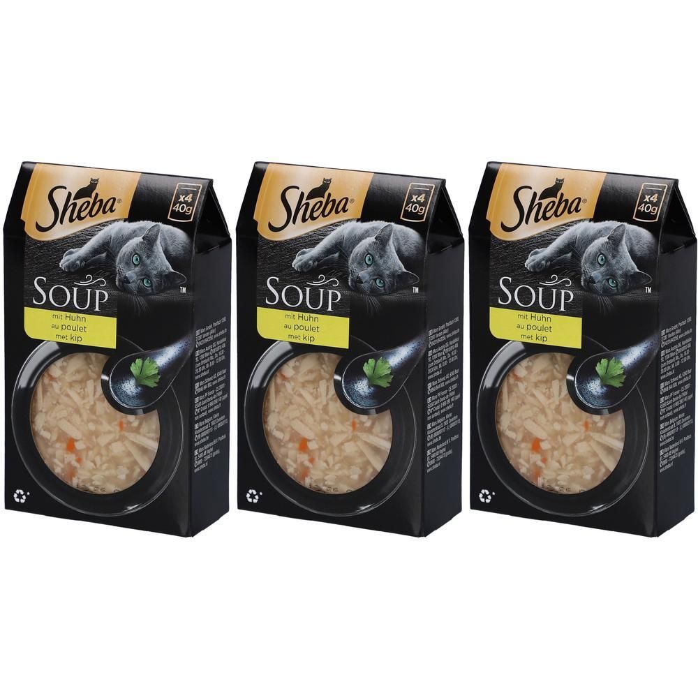 Trois boîtes de Sheba Soup. Emballage noir avec image de chat et nom du produit. Contenu : soupe au poulet.