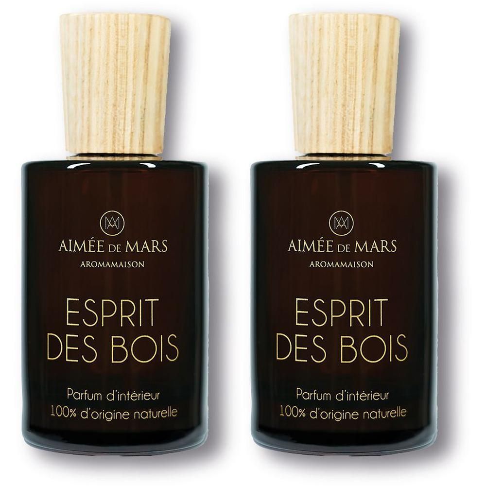 Zwei Flakons Esprit des Bois, braunes Glas, Holzverschluss. Goldfarbener Schriftzug. Aromamaison.
