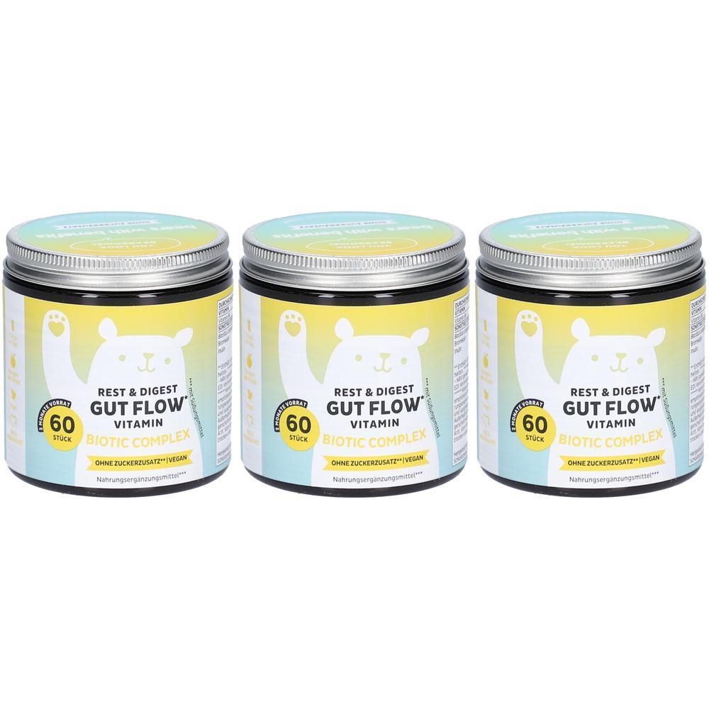 Drei Dosen mit Deckel. Aufschrift: Rest & Digest Gut Flow Vitamin, 60 Stück. Abbildung eines Bären. Blaue und gelbe Farbtöne.