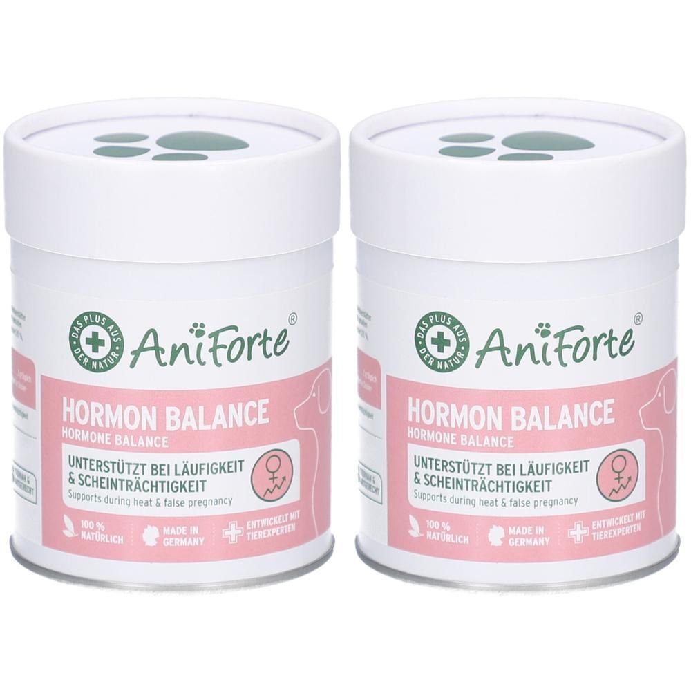 Deux boîtes blanches avec des étiquettes roses. Inscription : AniForte, Hormon Balance. Soutient les chaleurs et les fausses grossesses. Logo vert.