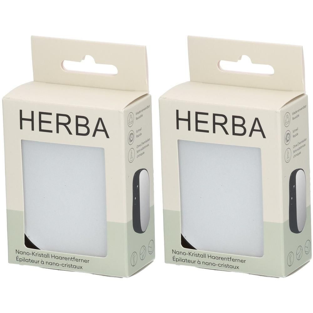 Zwei Schachteln HERBA Nano-Kristall Haarentferner. Weiße und grüne Verpackung mit Fenster.