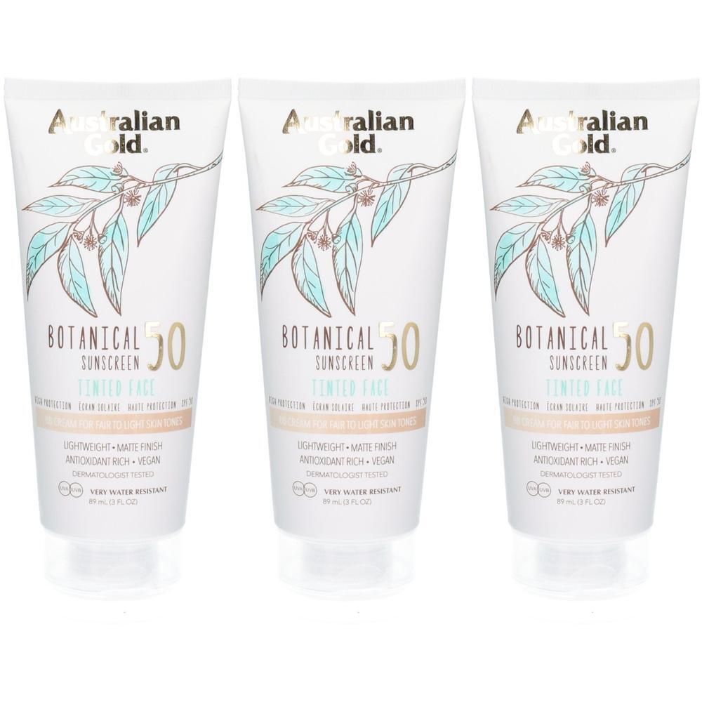Australian Gold Botanical LSF 50 getönte Sonnencreme, 3x 89ml. Weiße Tuben mit Pflanzenmotiv und Sonnenschutzangabe.